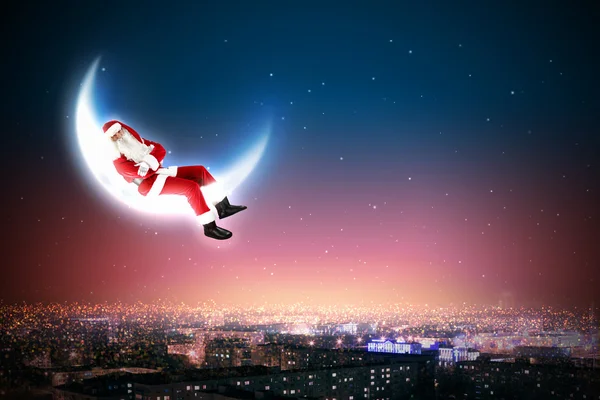 Noel Baba ve aya — Stok fotoğraf