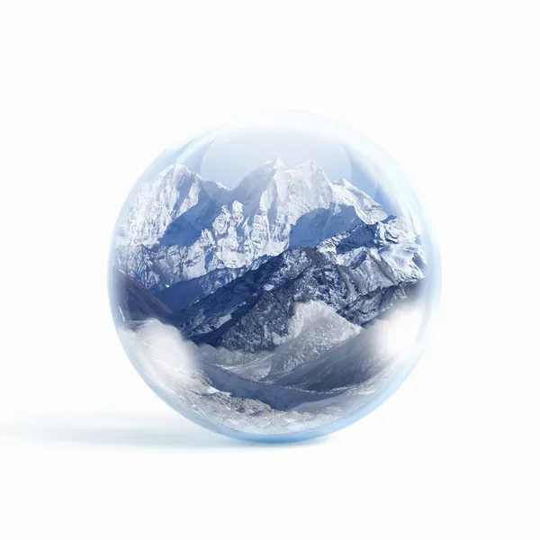 Snow mountains inside a glass ball — Stock Photo, Image