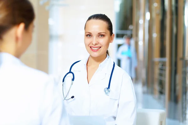 Portrait of two friendly female doctors — Stock Photo, Image