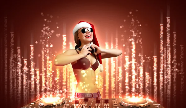 Female dj in christmas wear — Stock Photo, Image