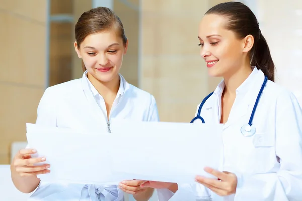 Portrait of two friendly female doctors — Stock Photo, Image