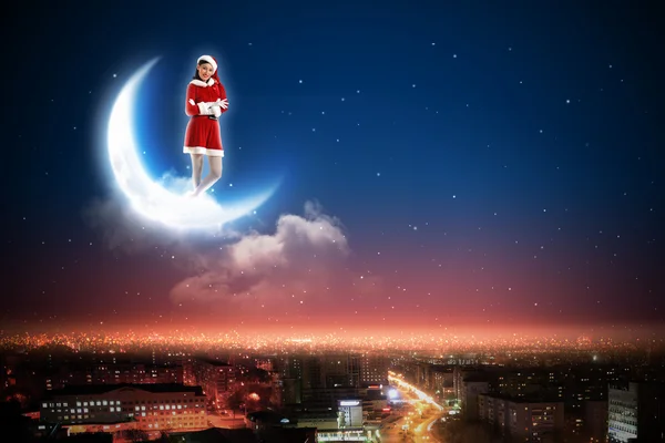 Santa flicka på månen — Stockfoto