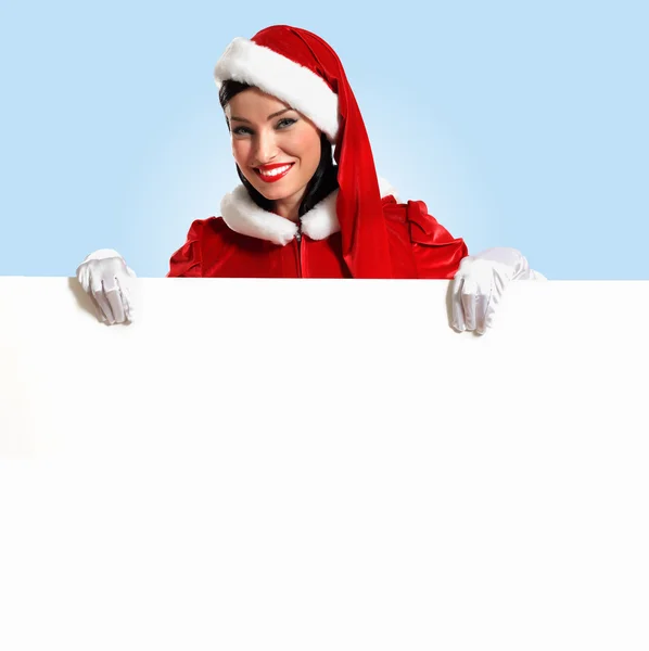 Santa girl with a blank banner — Stock Photo, Image