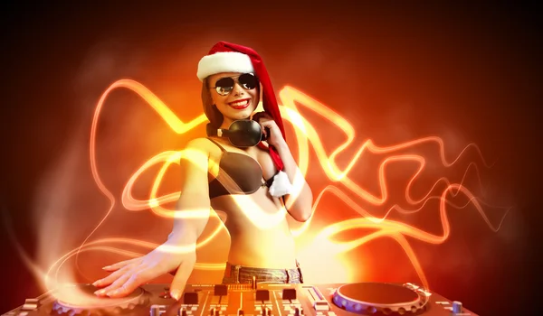 Female dj in christmas wear — Stock Photo, Image