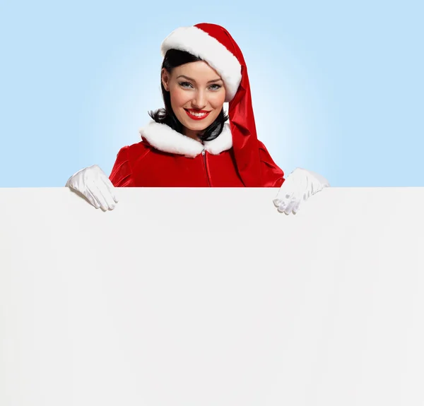 Santa girl with a blank banner — Stock Photo, Image