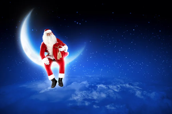 Foto von Weihnachtsmann auf dem Mond — Stockfoto