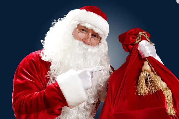 Santa claus with his gift bag — Stock Photo, Image