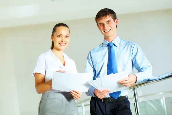 A portrait of a businesswoman and businessman Stock Photo