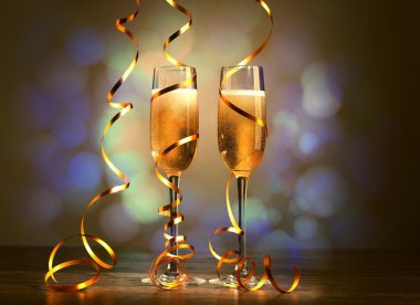 Glasses of champagne at new year party clipart