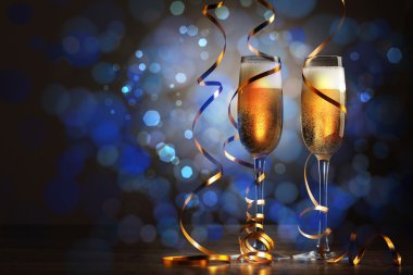 Glasses of champagne at new year party clipart