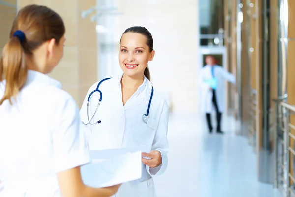 Portrait of two friendly female doctors — Stock Photo, Image