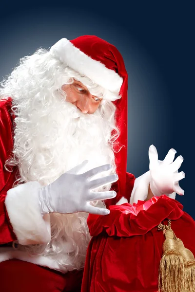 Santa Claus con su bolsa de regalo —  Fotos de Stock