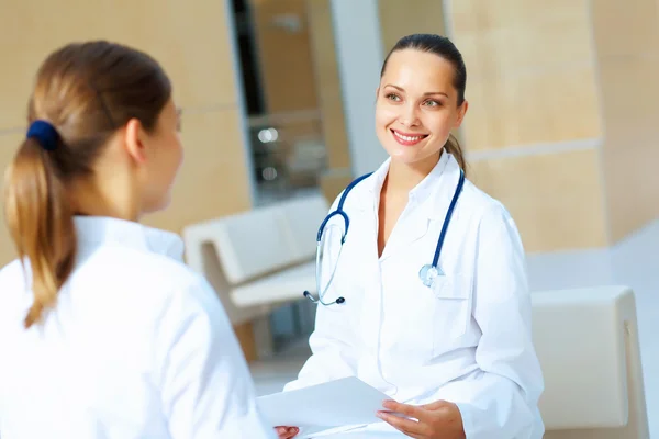 Portrait of two friendly female doctors — Stock Photo, Image