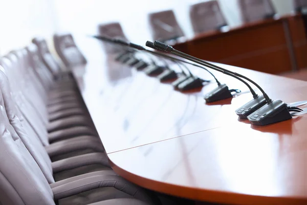 Conference hall with microphones — Stock Photo, Image