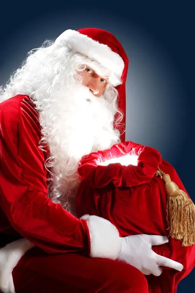 Santa Claus con su bolsa de regalo — Foto de Stock