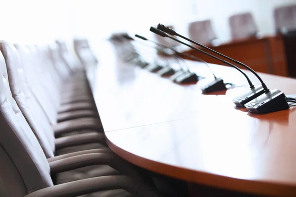 Conference hall with microphones — Stock Photo, Image