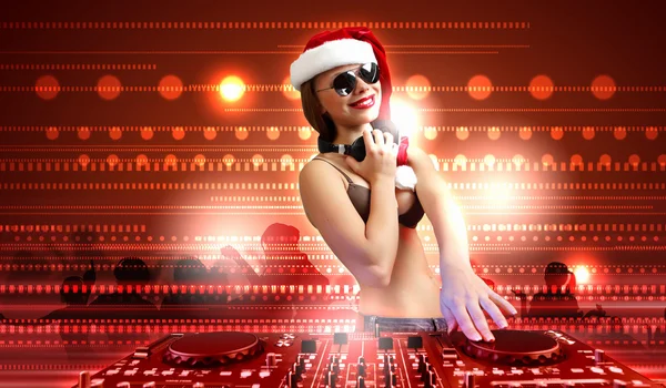 Female dj in christmas wear — Stock Photo, Image