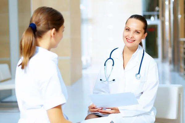 Portrait of two friendly female doctors — Stock Photo, Image