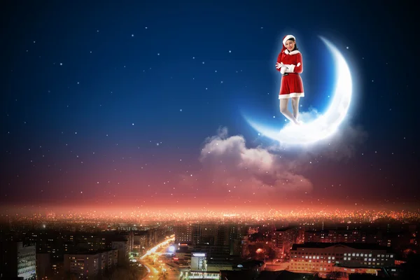 Santa girl on the moon — Stock Photo, Image