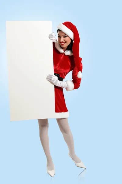 Santa girl with a blank banner — Stock Photo, Image