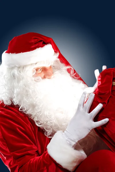 Santa claus reading a letter — Stock Photo, Image