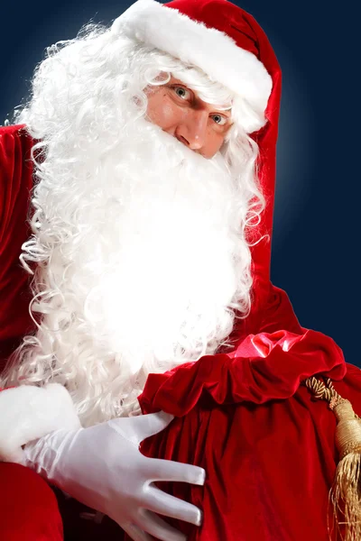 Babbo Natale con la sua borsa regalo — Foto Stock