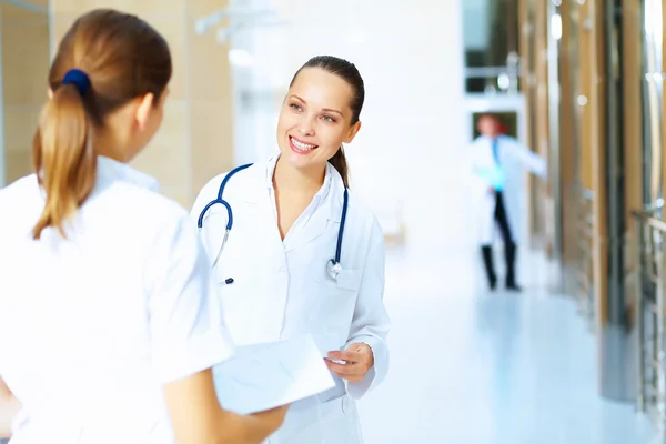 Portrait of two friendly female doctors — Stock Photo, Image