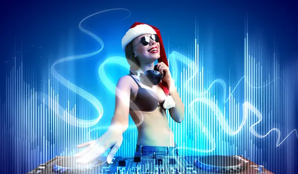 Female dj in christmas wear — Stock Photo, Image