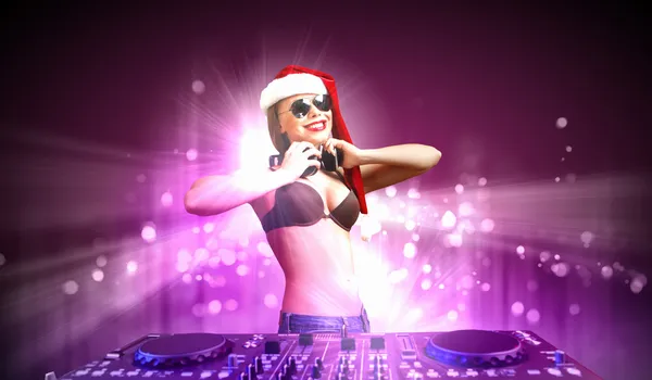 Female dj in christmas wear — Stock Photo, Image