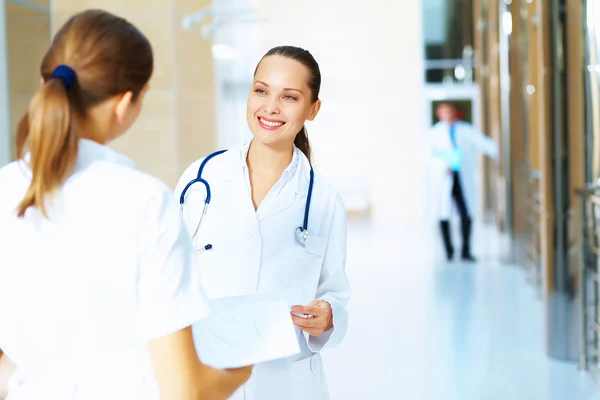 Portrait of two friendly female doctors — Stock Photo, Image