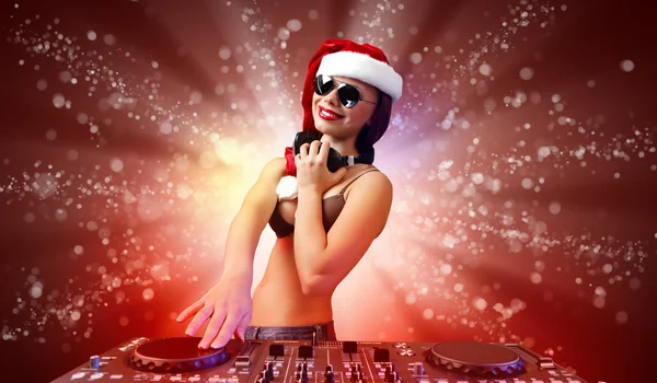 Female dj in christmas wear — Stock Photo, Image