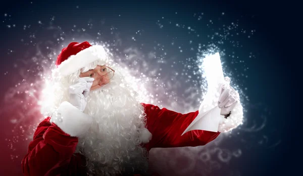 Santa with christmas letter Royalty Free Stock Photos