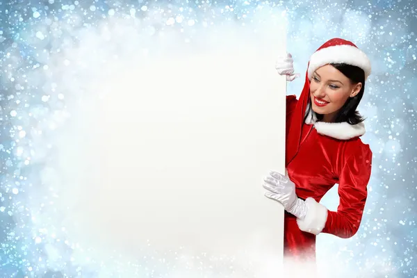 Santa girl with a blank banner — Stock Photo, Image