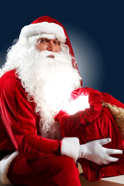 Weihnachtsmann mit seiner Geschenktüte — Stockfoto