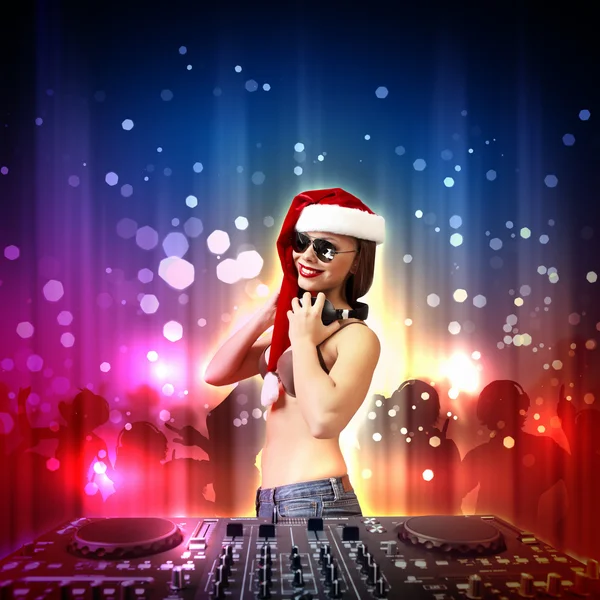 Vrouwelijke dj in Kerstmis slijtage — Stockfoto