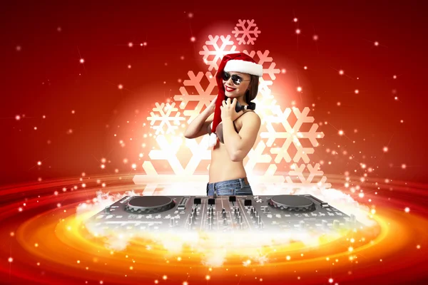 Female dj in christmas wear — Stock Photo, Image