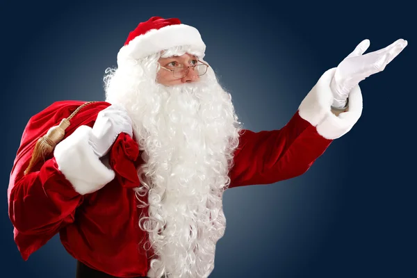 Santa claus with his gift bag — Stock Photo, Image