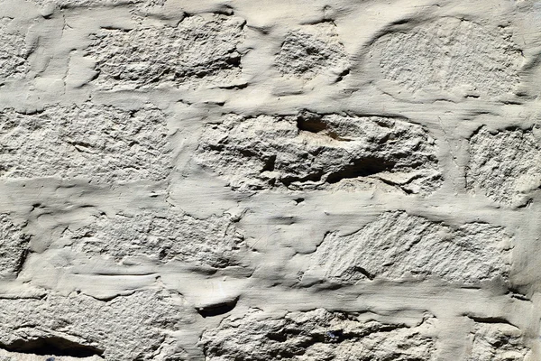 Естественный узор каменной стены — стоковое фото