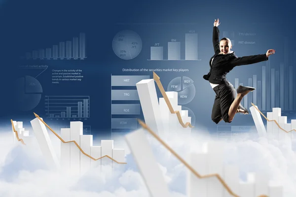 Businesswoman in black suit jumping — Stock Photo, Image