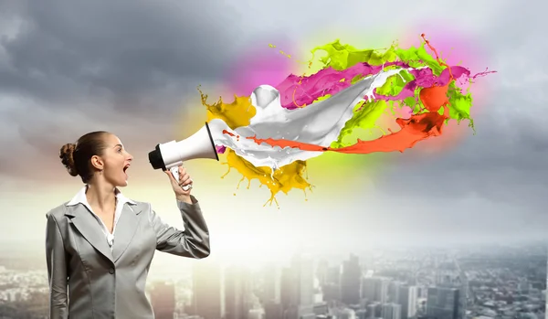 Businesswoman with megaphone — Stock Photo, Image