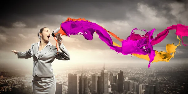 Businesswoman with megaphone — Stock Photo, Image