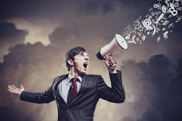 Homem de negócios com megafone — Fotografia de Stock