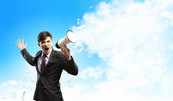 Businessman with megaphone — Stock Photo, Image