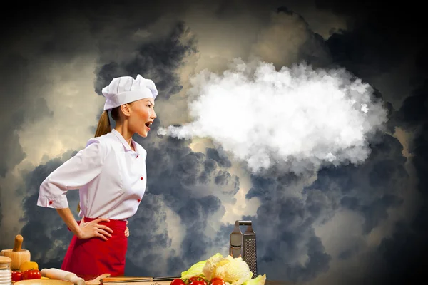 Asian female cook in anger — Stock Photo, Image