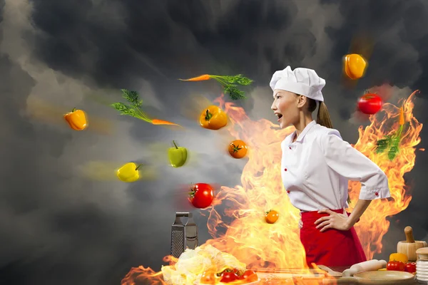 Asian female cook in anger — Stock Photo, Image