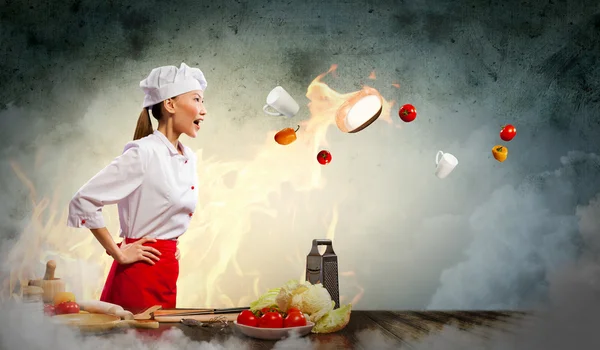 Asian female cook in anger — Stock Photo, Image