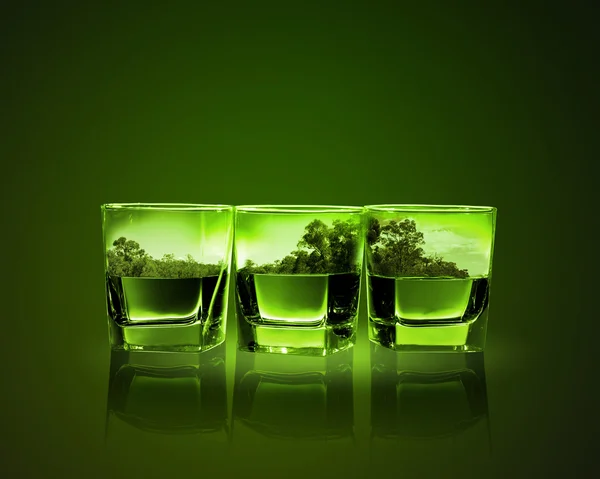 Three glasses of green absinth — Stock Photo, Image