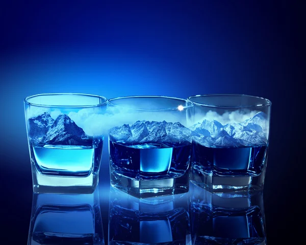 Three glasses of blue liquid — Stock Photo, Image