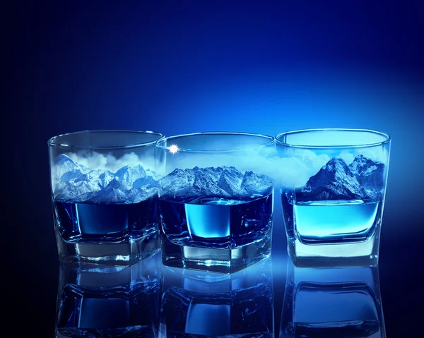 Three glasses of blue liquid — Stock Photo, Image