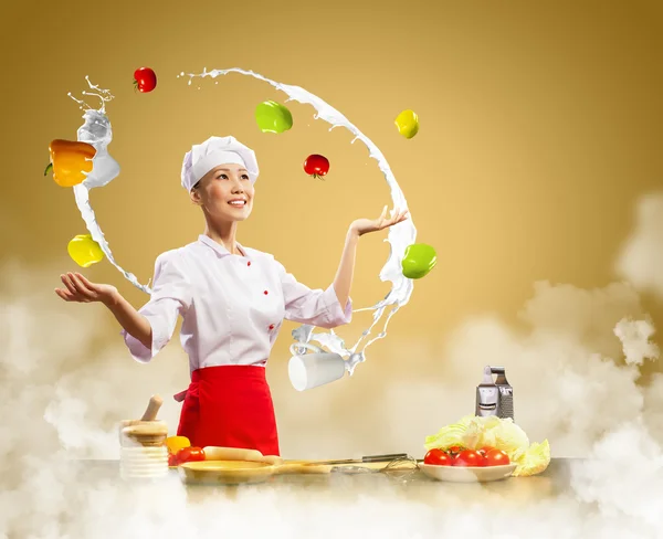 Juggler female cook — Stock Photo, Image